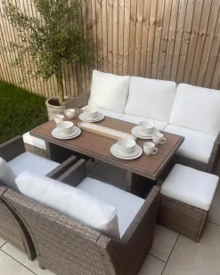 FONTI 5 personers Loungesæt med bord og fodskammel Brun PE-rattan med puder